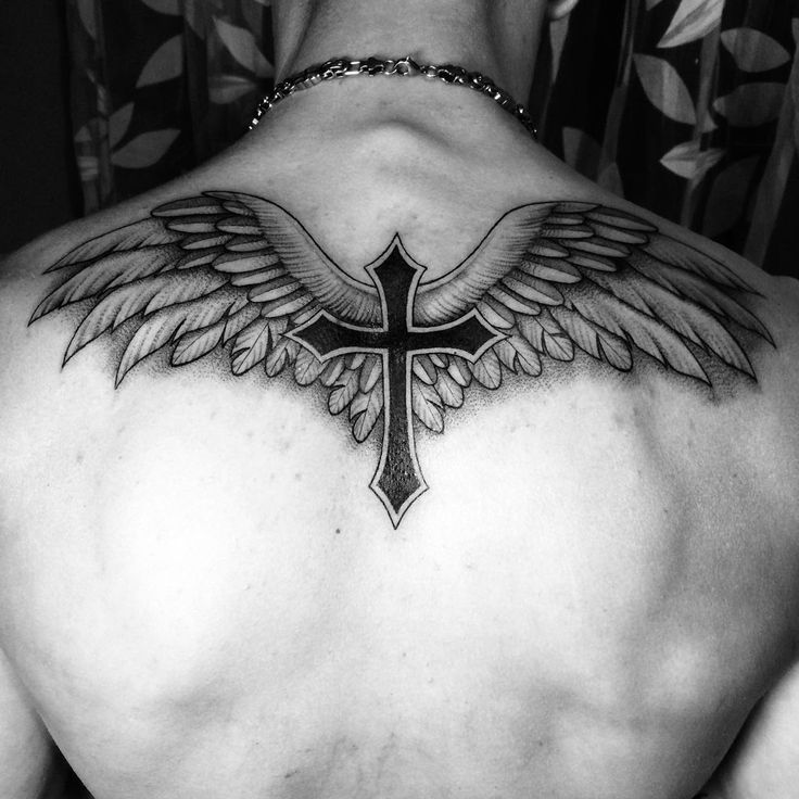 Trending Cross Tattoo Designs for Men: Meaningful and Bold 9